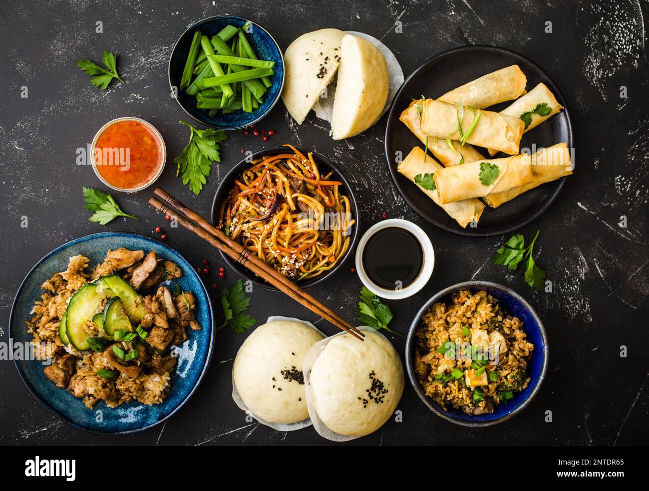 Asian assorted food set, dark rustic stone background. Chinese dishes ...