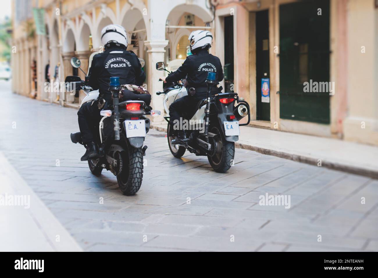 Greek police squad formation on duty riding bike and motorcycle and ...