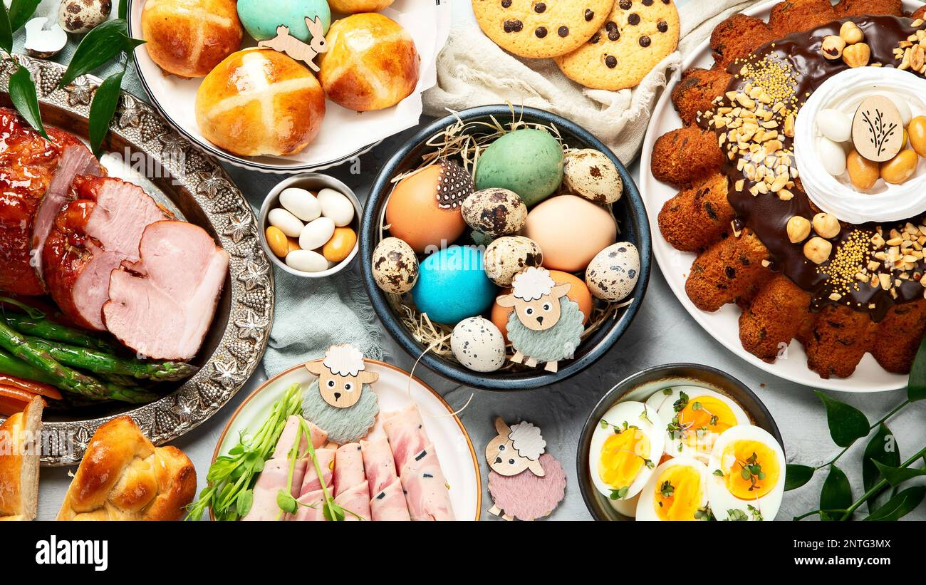 Classic Easter ham dinner. Top view table scene on a white background