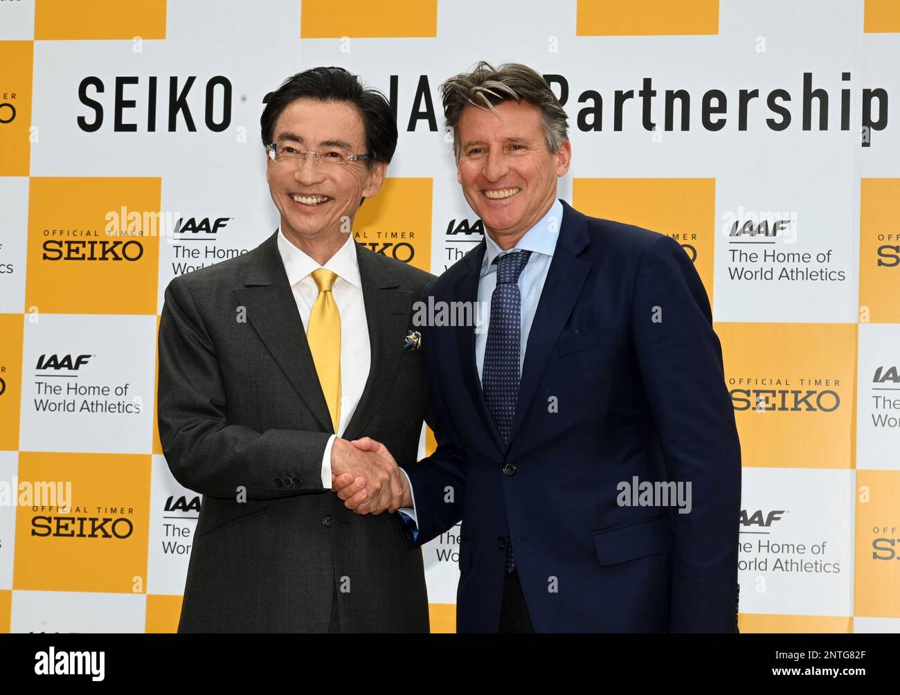 Seiko Holdings Corporatin chairman and group chief executive officer Shinji  Hattori (left) and IAAF president Sebastian Coe shake hands during a news  conference prior to the IAAF World Relays, Friday, May 10,