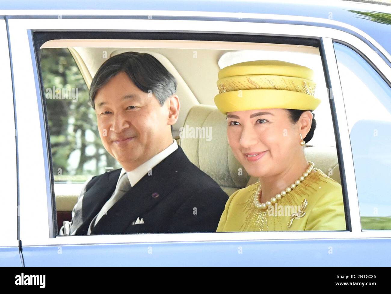 Japan's new Emperor Naruhito and Empress Michiko head for the Imperial
