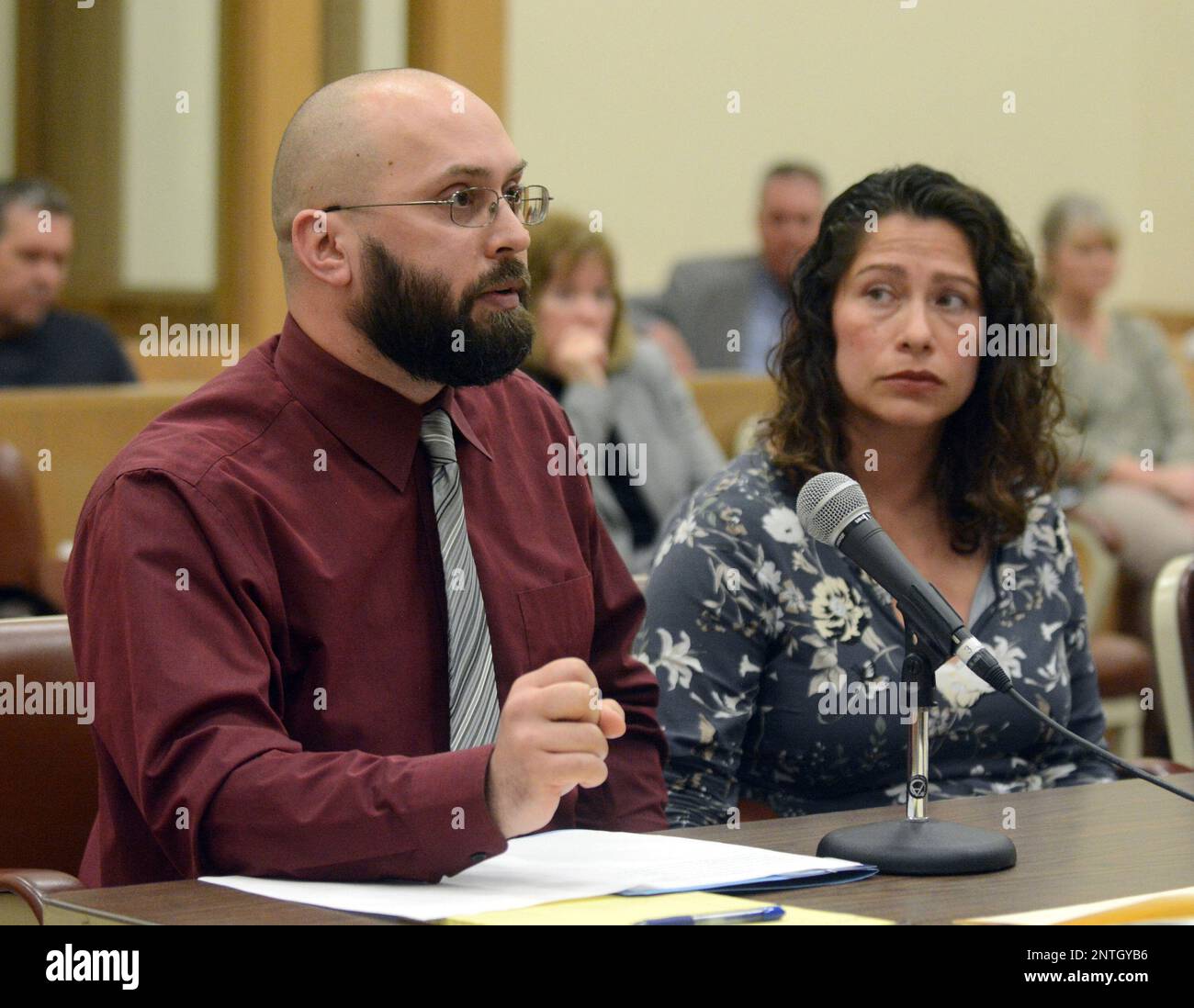 Elizabeth Winkler sits with her husband retired Willimantic Police