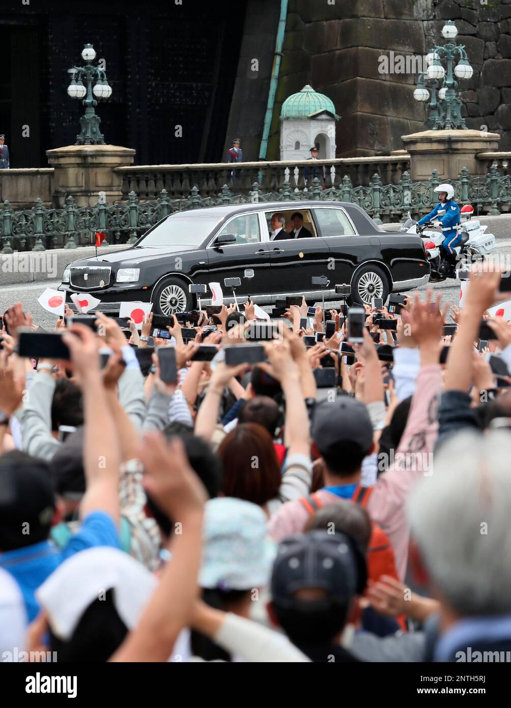 Japan's new Emperor Naruhito leaves the Imperial Palace after attending a ceremony for