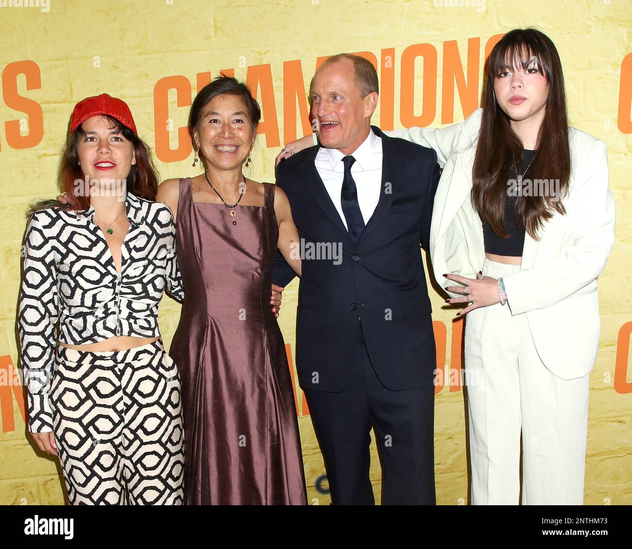 Woody Harrelson, wife Laura Louie and daughters attending the