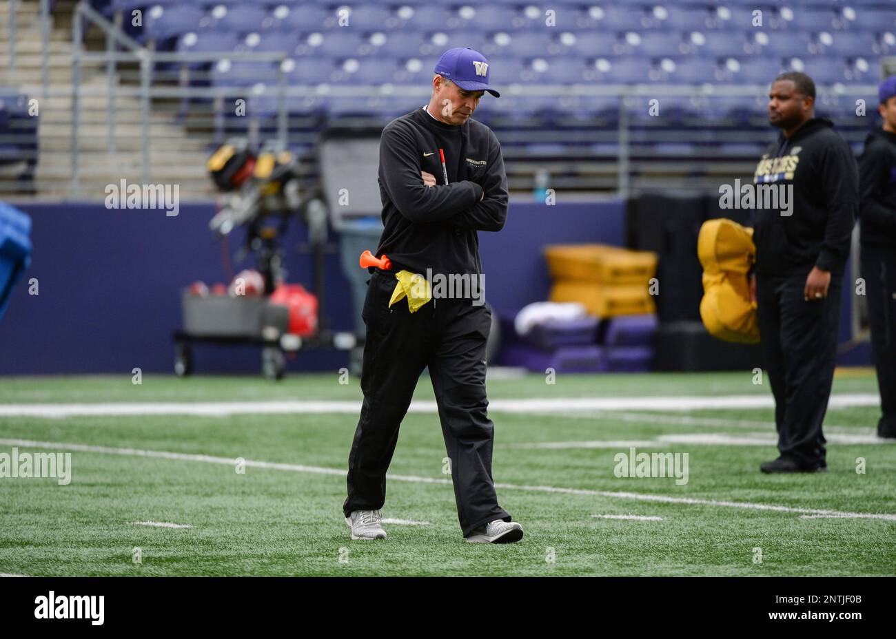 April 17, 2019 UW Head Coach CHRIS PETERSEN walks in between drills during the Washington