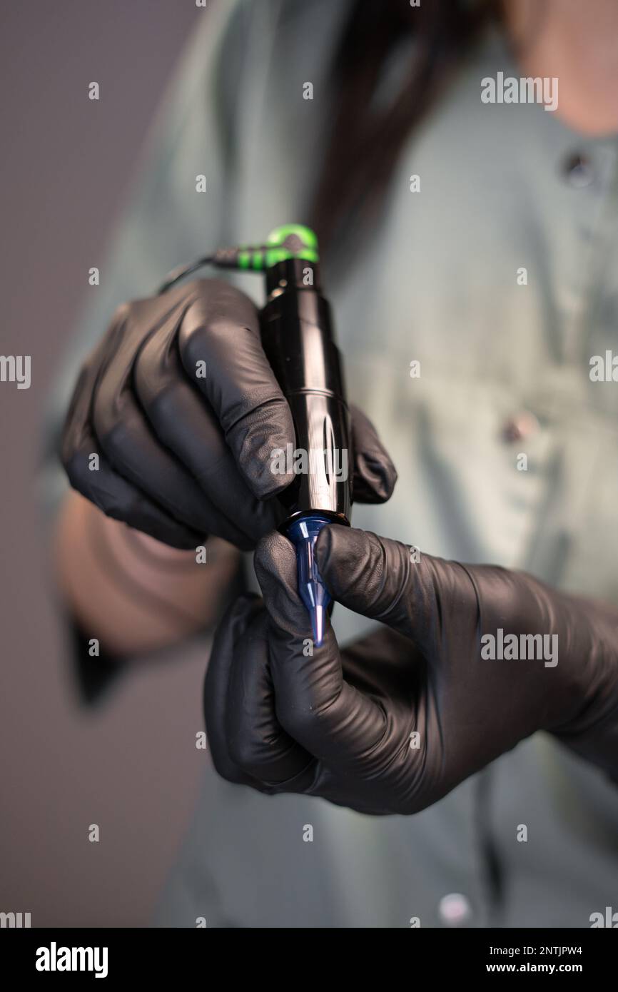 Black latex gloves hi-res stock photography and images - Alamy