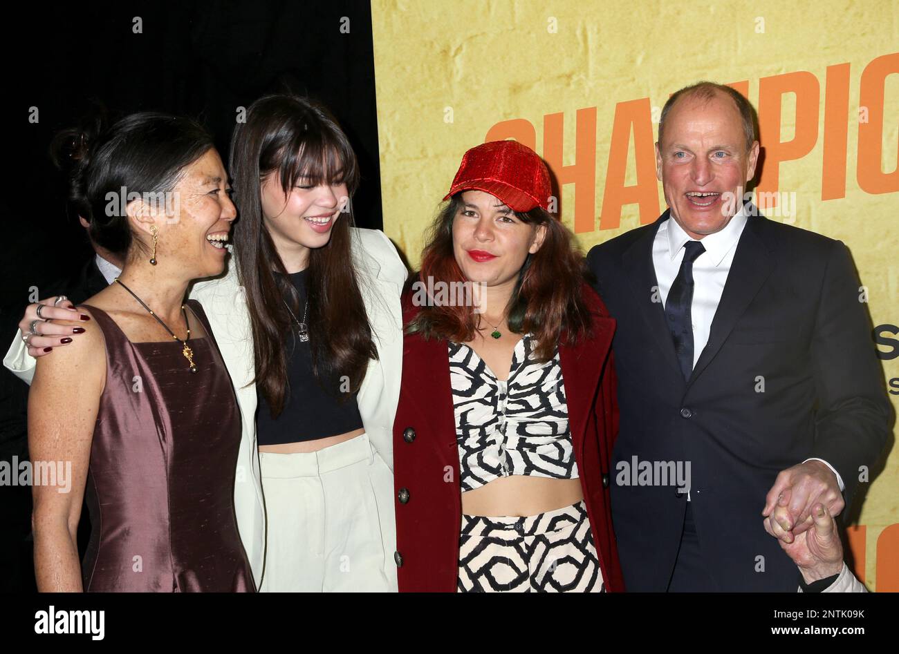 Woody Harrelson, wife Laura Louie and daughters attending the