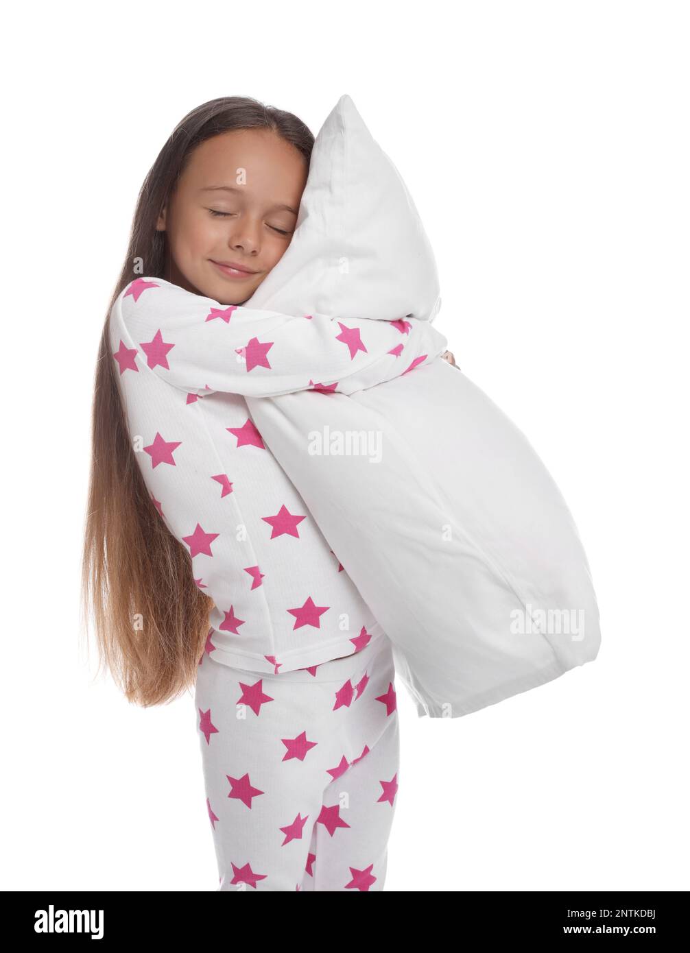 Cute girl wearing pajamas with pillow on white background Stock Photo ...