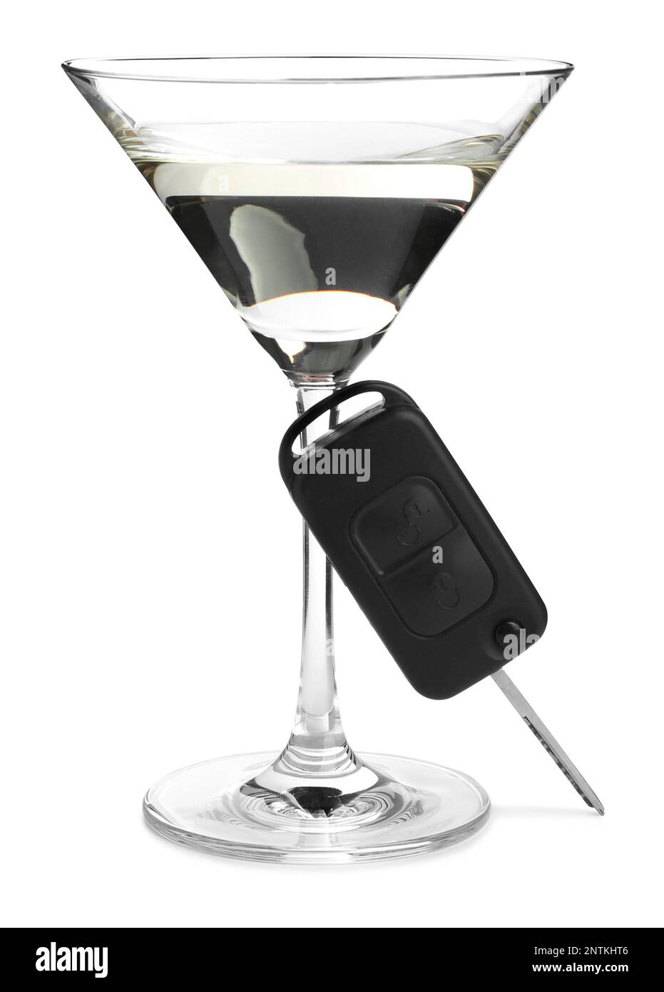 Glass of alcohol and car key on white background. Drunk driving concept Stock Photo