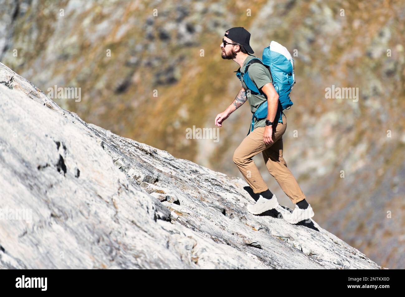 Man walks on rocks hi-res stock photography and images - Alamy