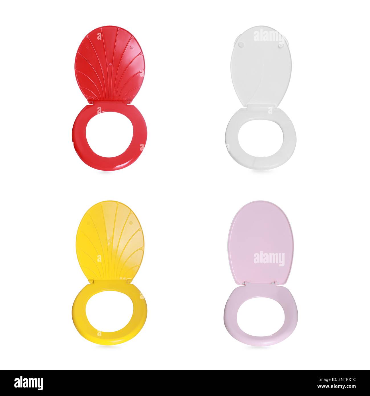 Set with different plastic toilet seats on white background Stock Photo