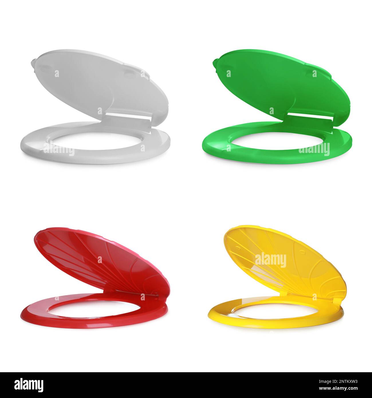 Set with different plastic toilet seats on white background Stock Photo