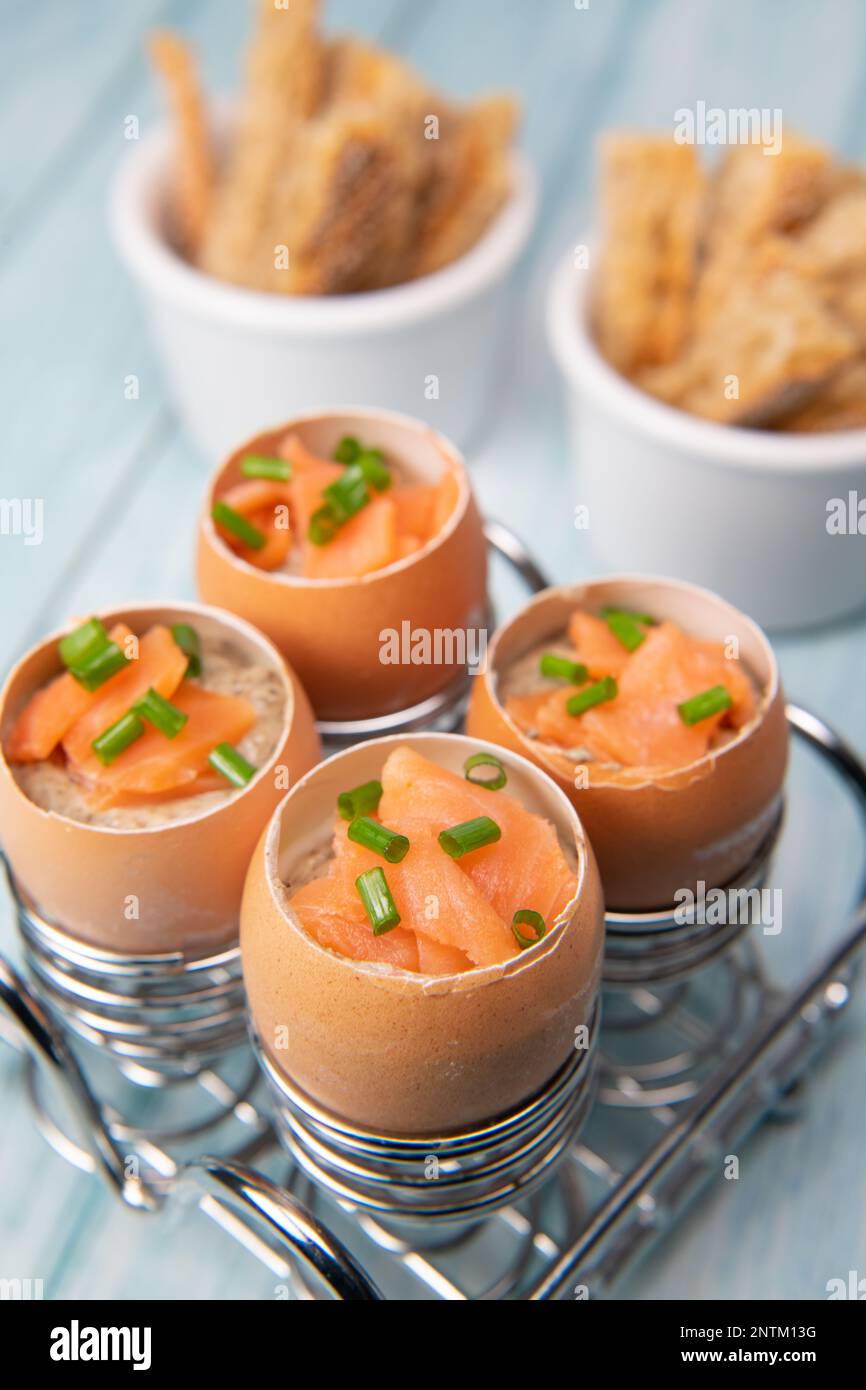 Recipe eggs casserole cooked in the shell with mushroom cream sauce and