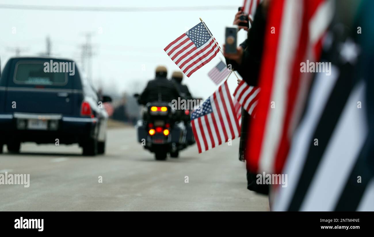The hearse carrying the body of Illinois State Trooper Gerald Ellis