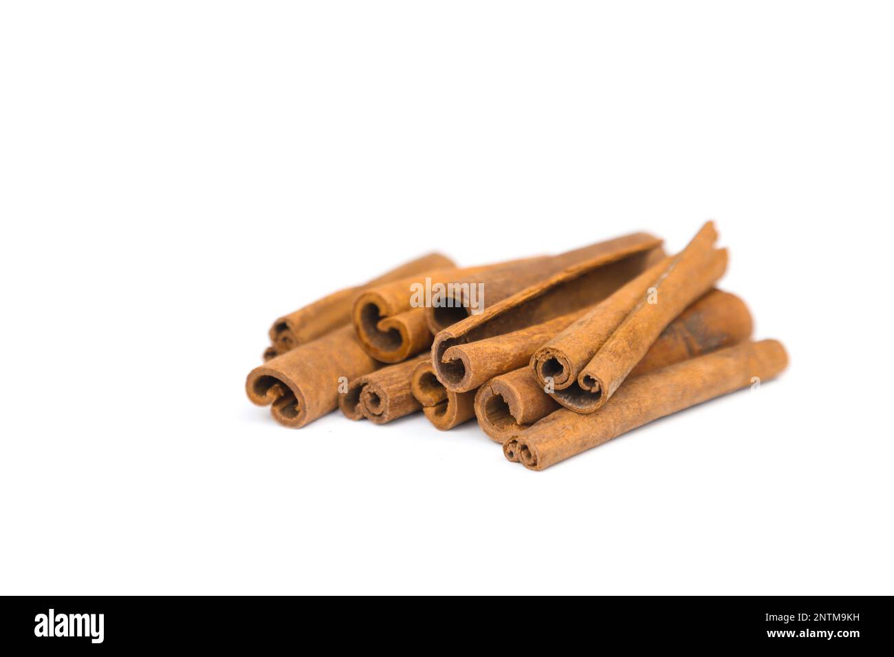 Cinnamon Stack Stack of cinnamon sticks isolated on white background. Closeup ...