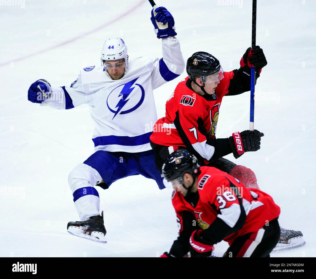 Tampa Bay Lightning defenseman Jan Rutta (44) takes a hit from Ottawa