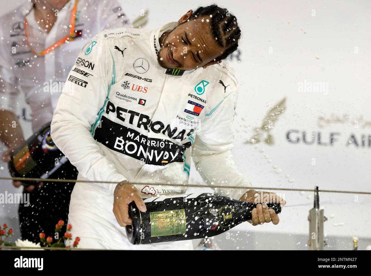 Mercedes driver Lewis Hamilton of Britain celebrates after winning the