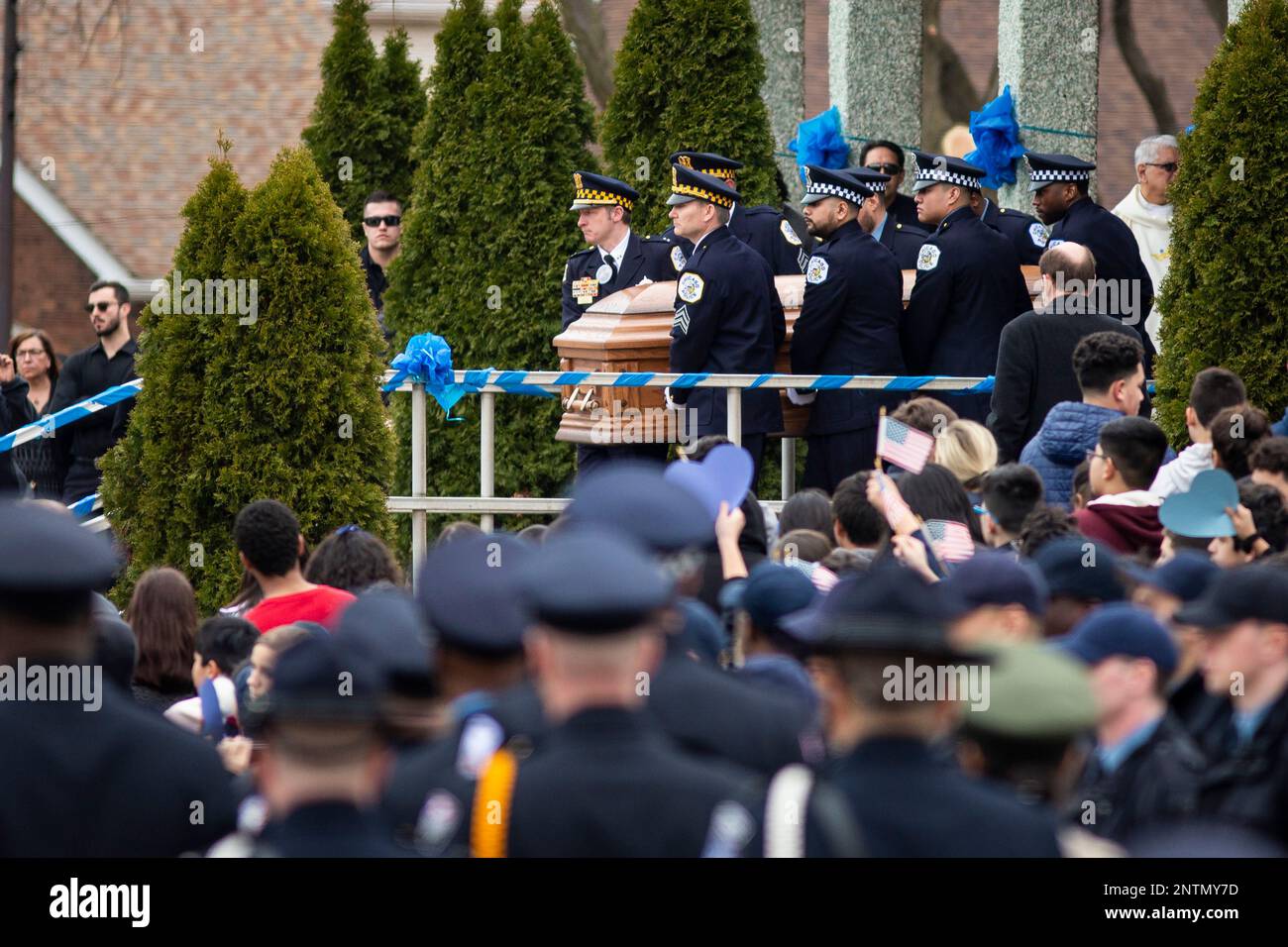 Pallbearers carry the casket of chicago police officer john p rivera