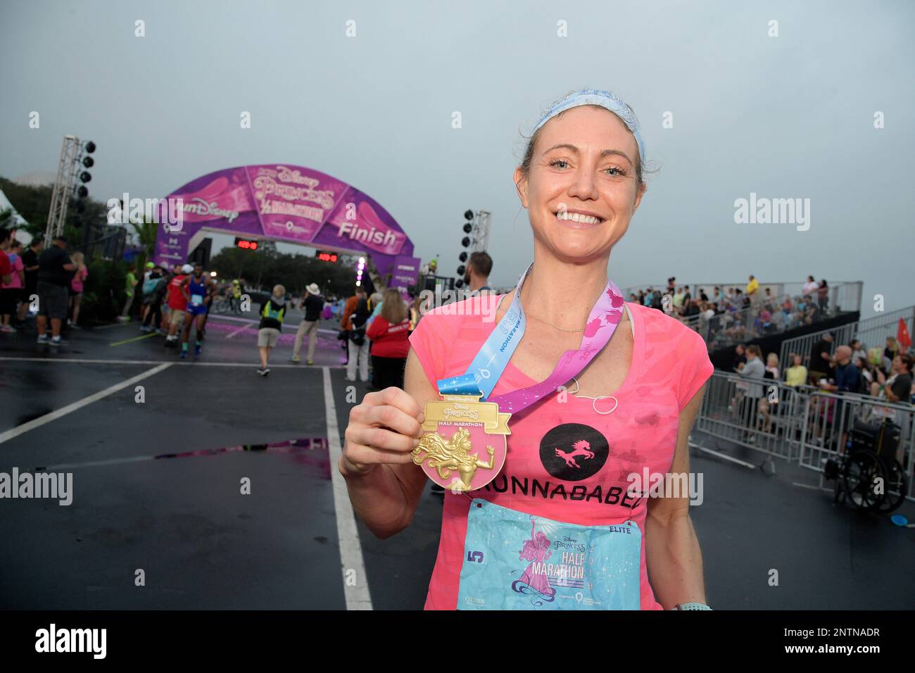 Jackie Pirtlehall shows her medal after winning the Disney Princess