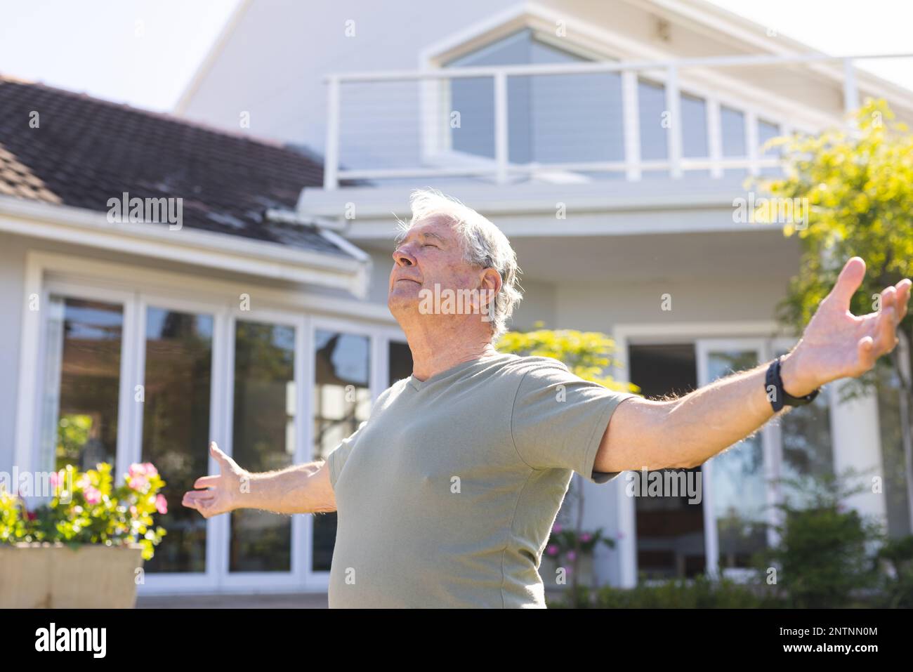 Happy man doing stretching hi-res stock photography and images - Alamy