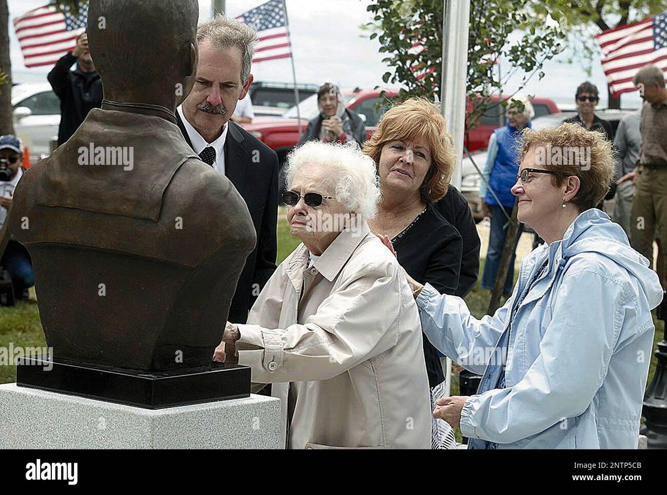 William R. Charette CORRECTS DATE - In this 2017 photo, Peg Ezdebski, surrounded by her ...