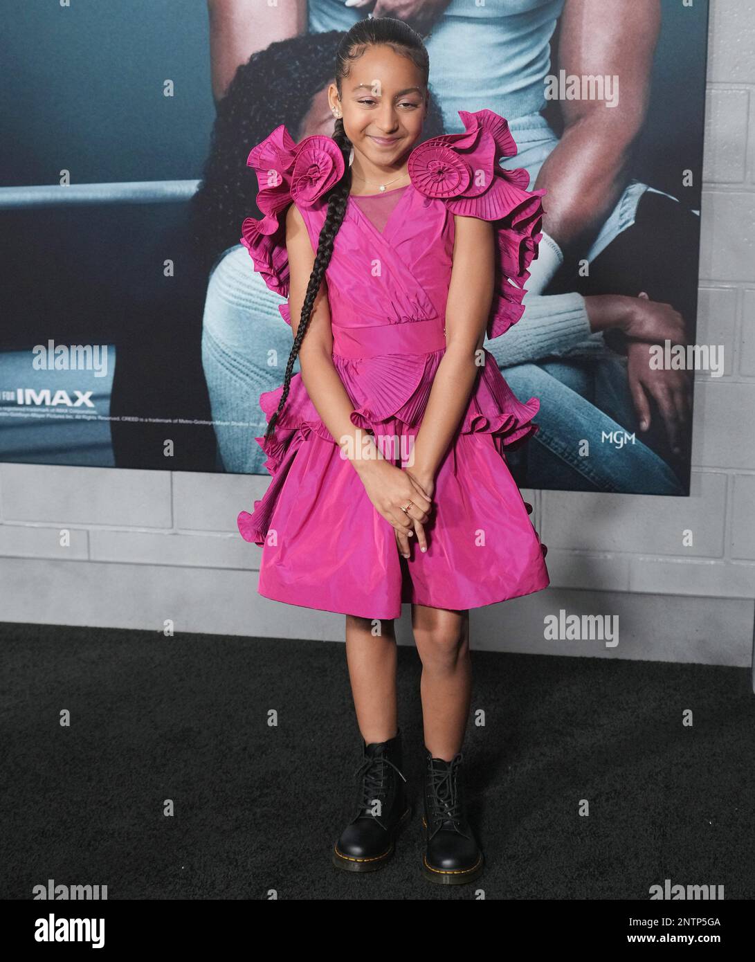 Mila Davis-Kent arrives at the CREED III Los Angeles Premiere held at