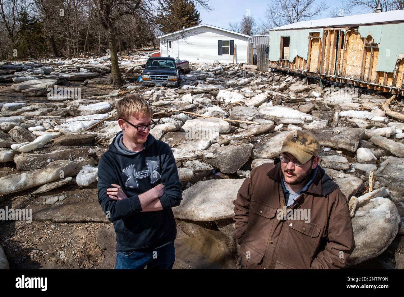Shawn Shonerd and Andrew Bauer stand in the Bellwood Lakes neighborhood