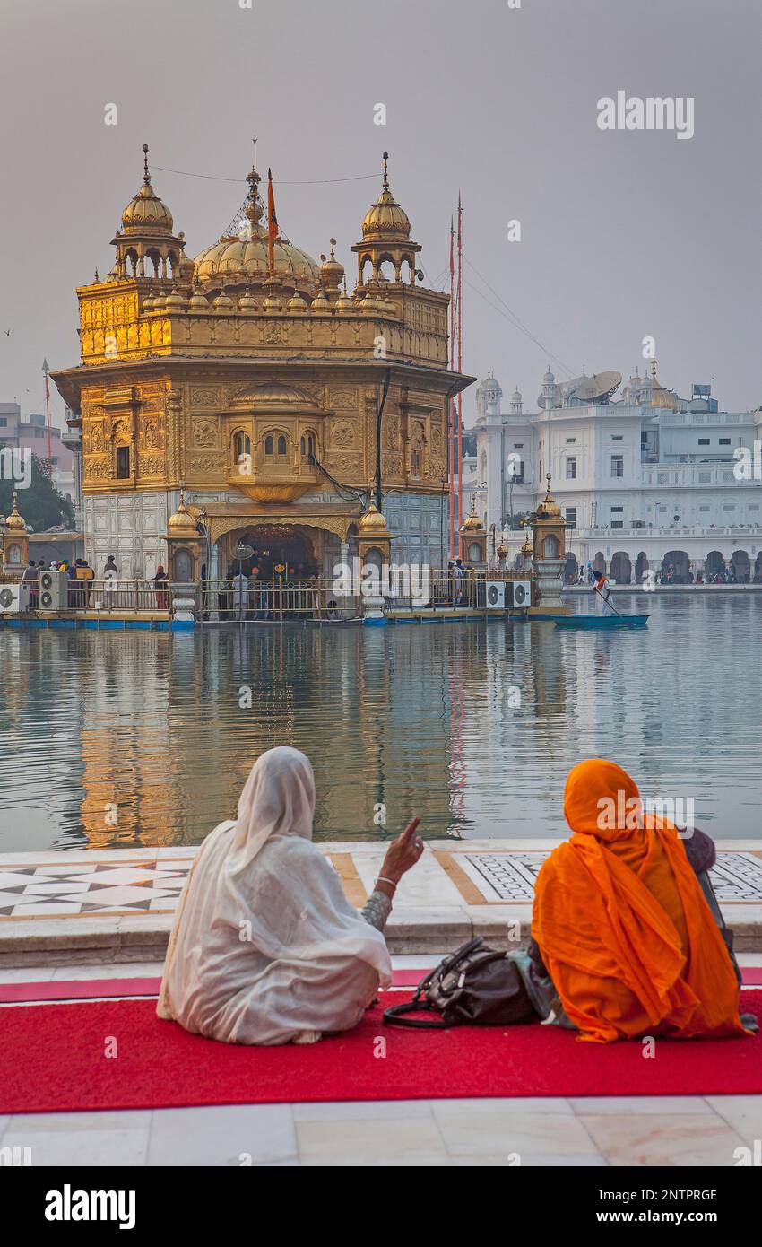 pilgrims and sacred pool Amrit Sarovar, Golden temple, Amritsar, Punjab