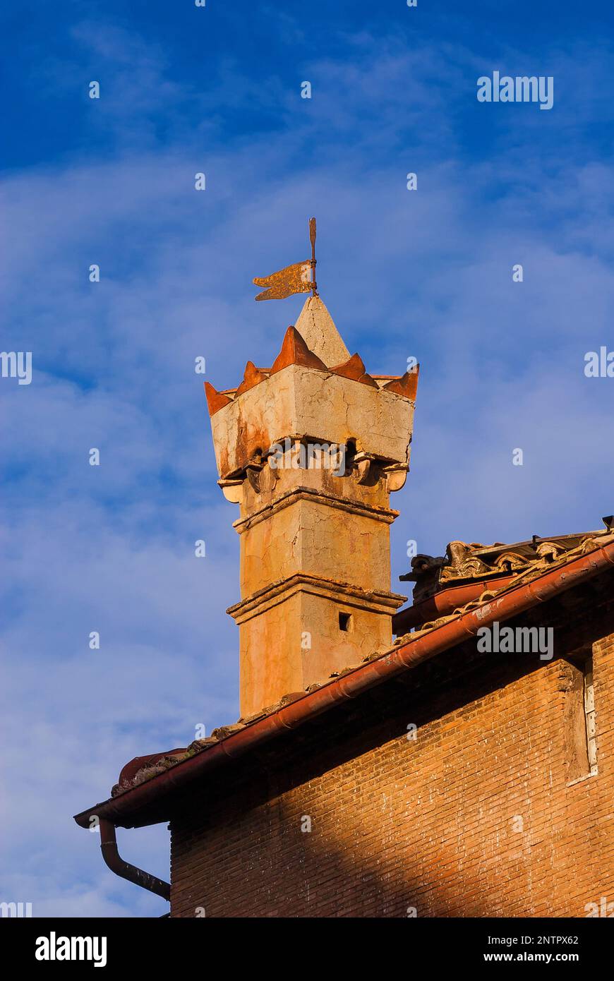Ancient architectures in Rome. Old chimney with iron flag Stock Photo ...