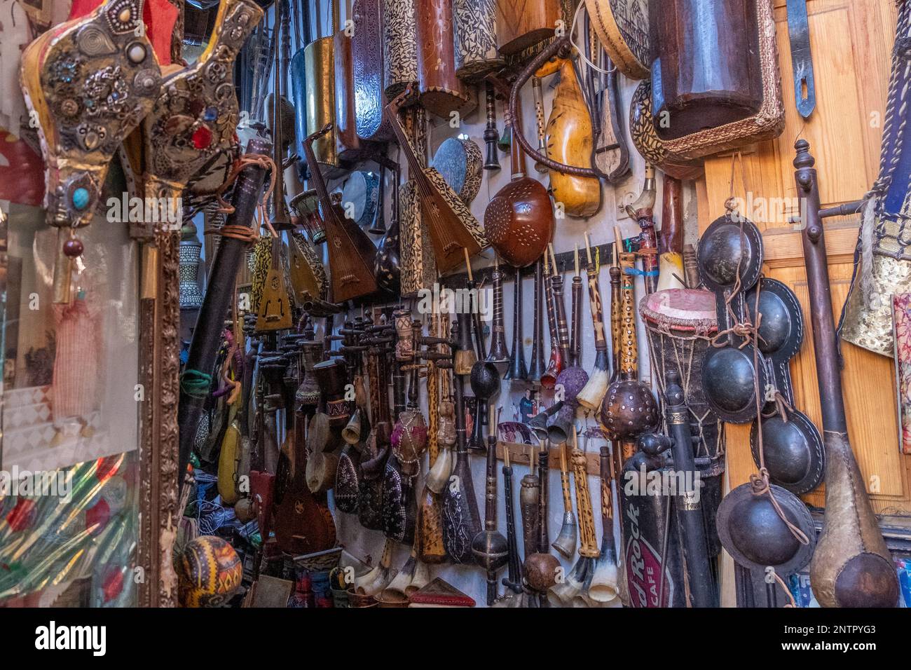 musical instruments and wooden decorative objects in a shop in a souk ...
