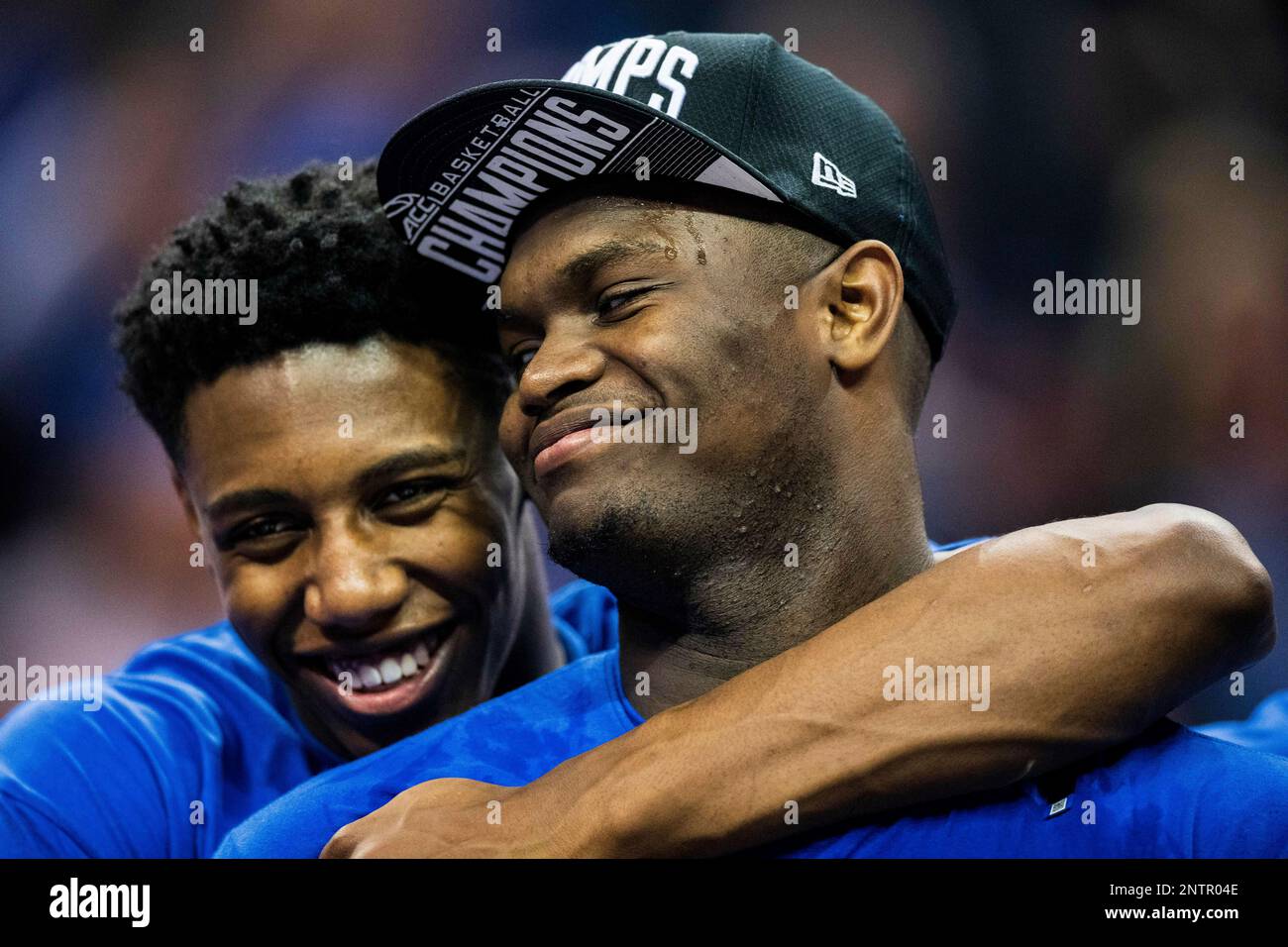 CHARLOTTE, NC - MARCH 16: Duke Blue Devils forward RJ Barrett (5) dunks  while Duke Blue Devils forward Zion Williamson (1) celebratess during the  2nd half of the ACC Tournament championship game