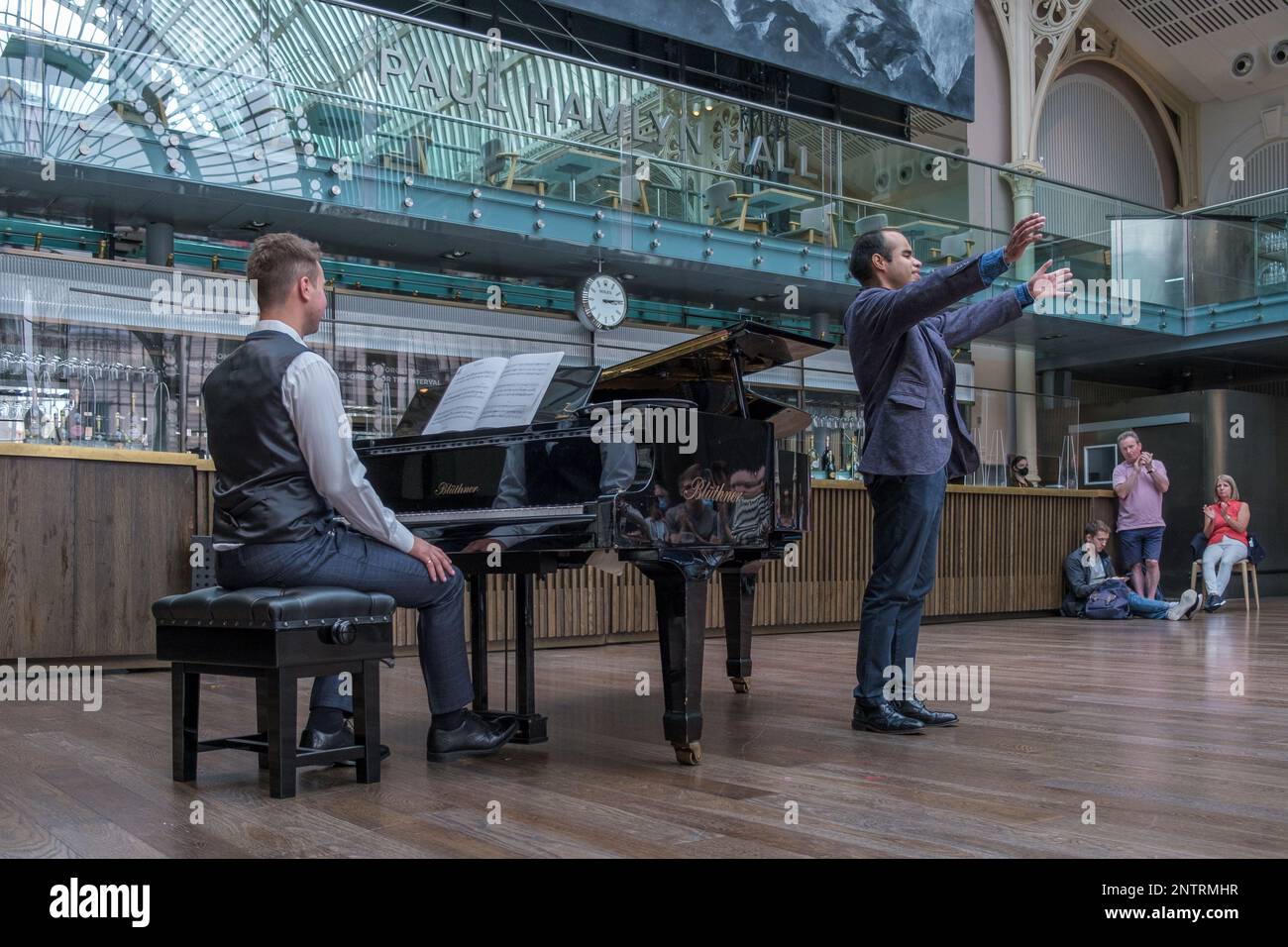 Tenor Alan Pingarron  performs accompanied by Edmund Whitehead at the Paul Hamlyn Hall (Floral Hall) Royal Opera House Covent Garden, London, UK Stock Photo