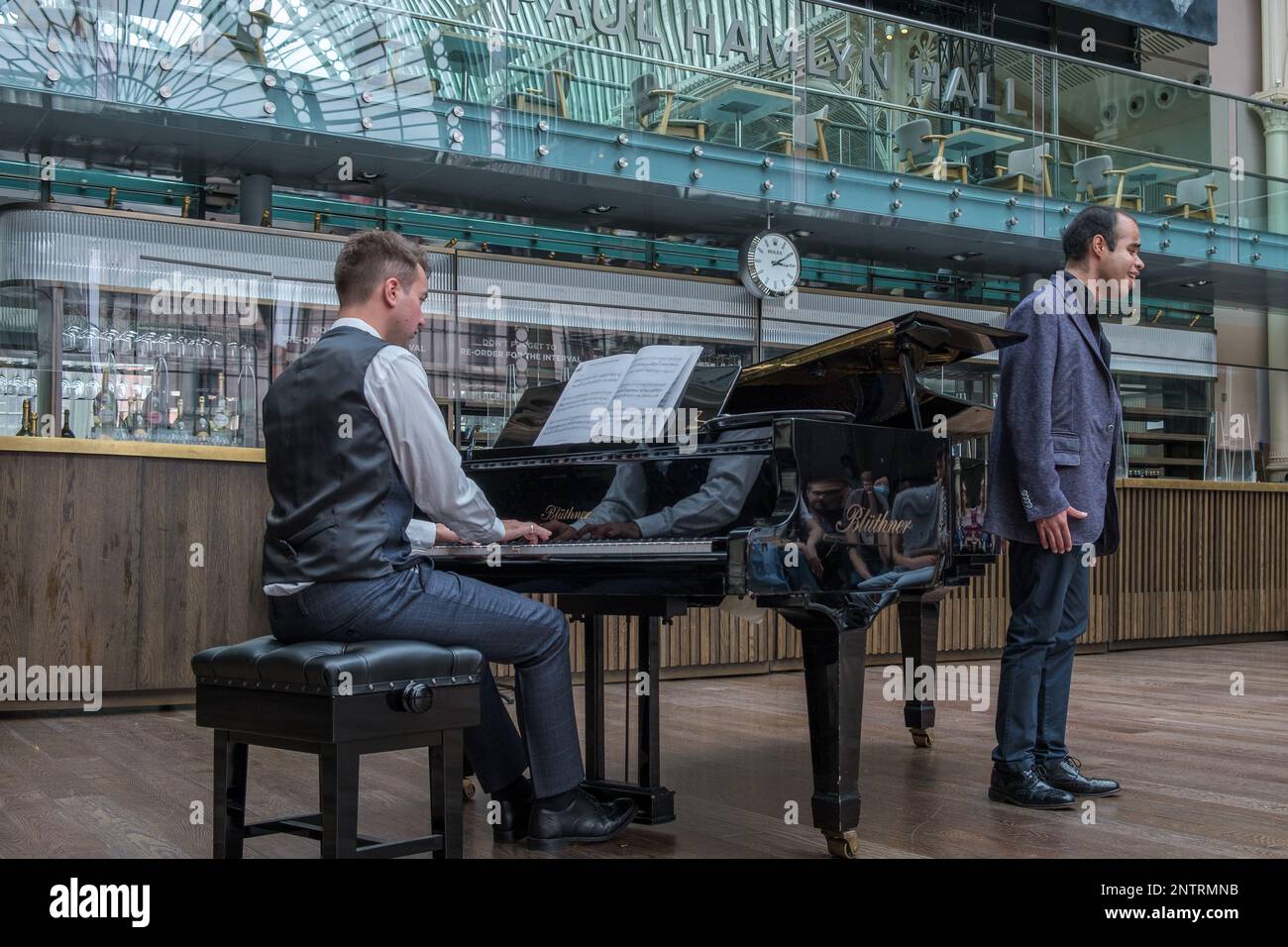 Tenor Alan Pingarron  performs accompanied by Edmund Whitehead at the Paul Hamlyn Hall (Floral Hall) Royal Opera House Covent Garden, London, UK Stock Photo