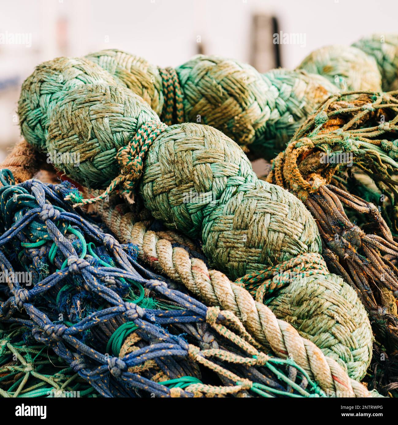 Mooring ropes and nets on a fishing boat. Accessories needed for fishing.  Spring season Stock Photo - Alamy