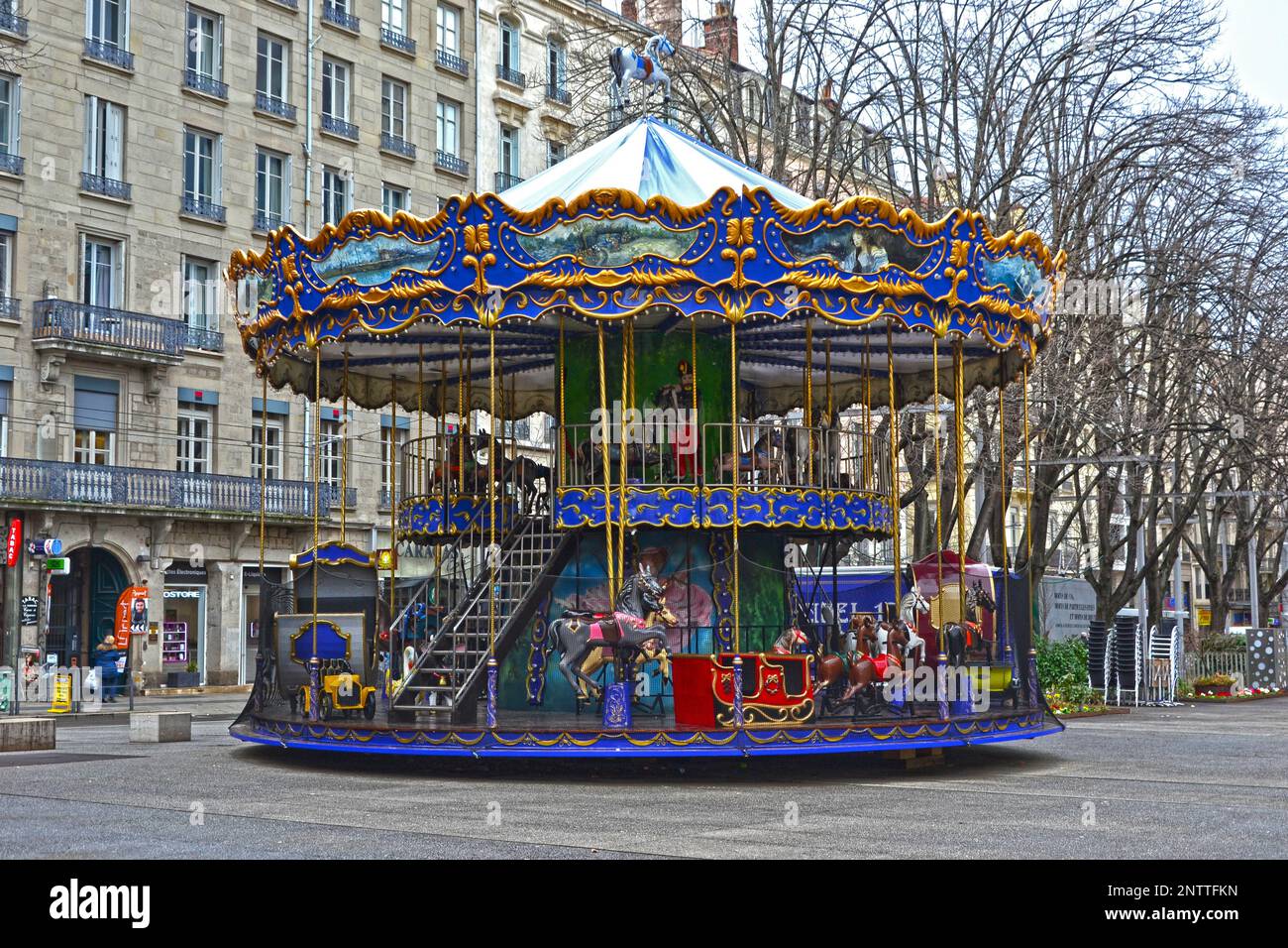 Saint-Etienne, France - January 27th 2020 : Focus on a traditional carousel, closed for the day. The kids can go on animals like horses and reindeers. Stock Photo