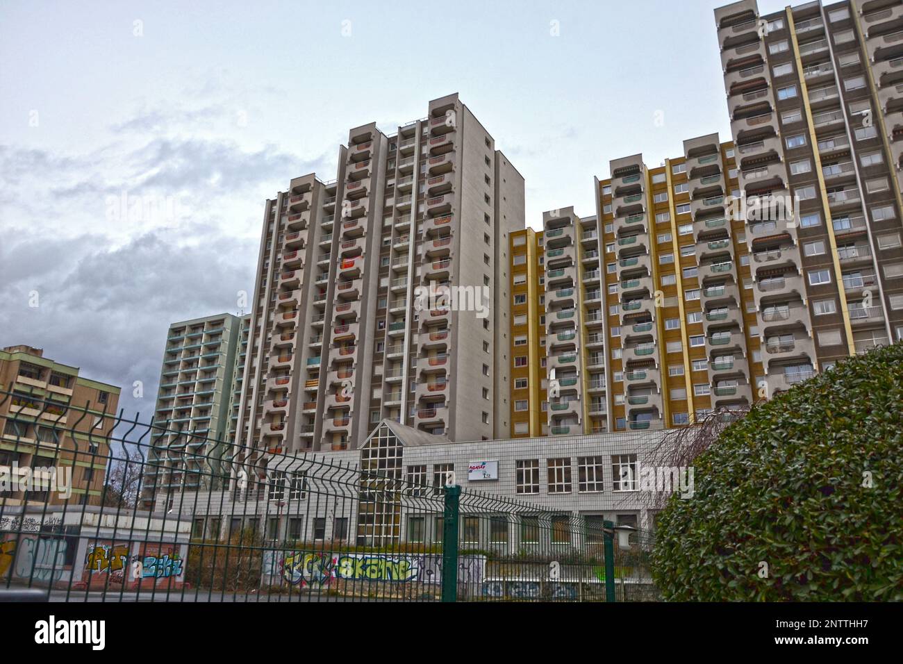 Saint-Etienne, France - January 27th 2020 : Focus on white cream modern buildings with a parking, known as 'HLM' in France. Stock Photo