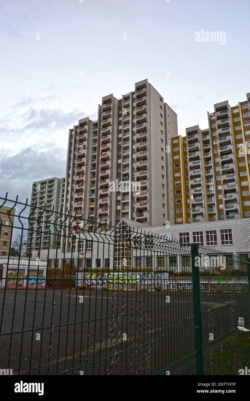 Saint-Etienne, France - January 27th 2020 : Focus on white cream modern buildings with a parking, known as 'HLM' in France. Stock Photo