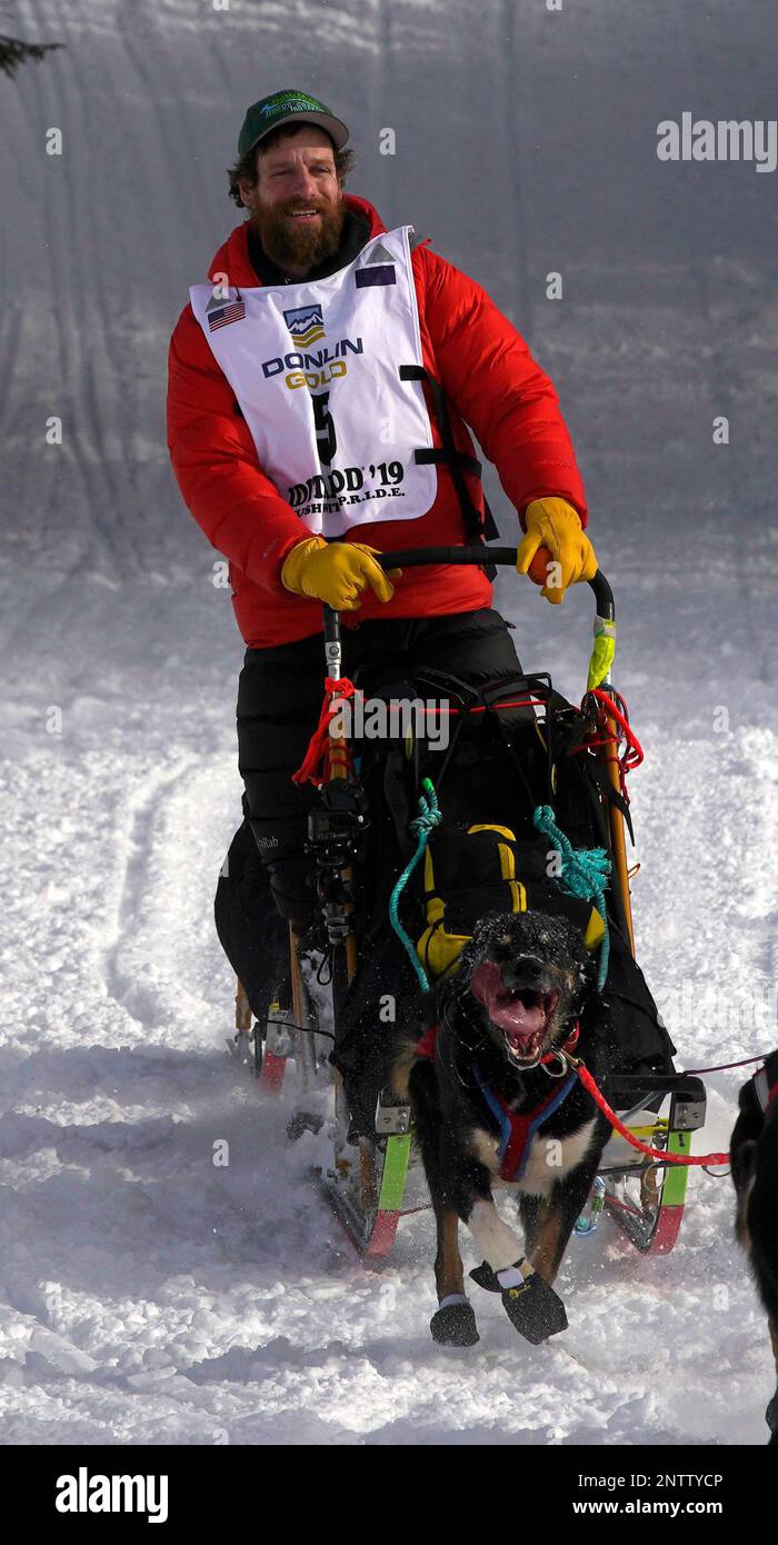 Musher Jessie Holmes of Nenana Alaska enters Long Lake at the Iditarod