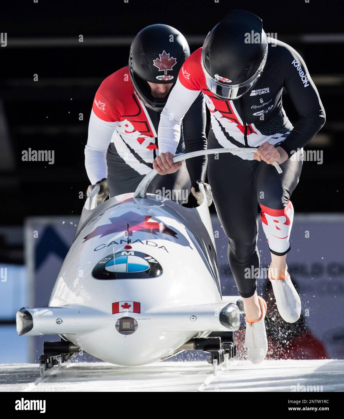 Canadas Kori Hol, front, and Melissa Lotholz race down the track on their third run during the womens bobsled event at the Bobsleigh World Championships in Whistler, British Columbia, Sunday March 3,