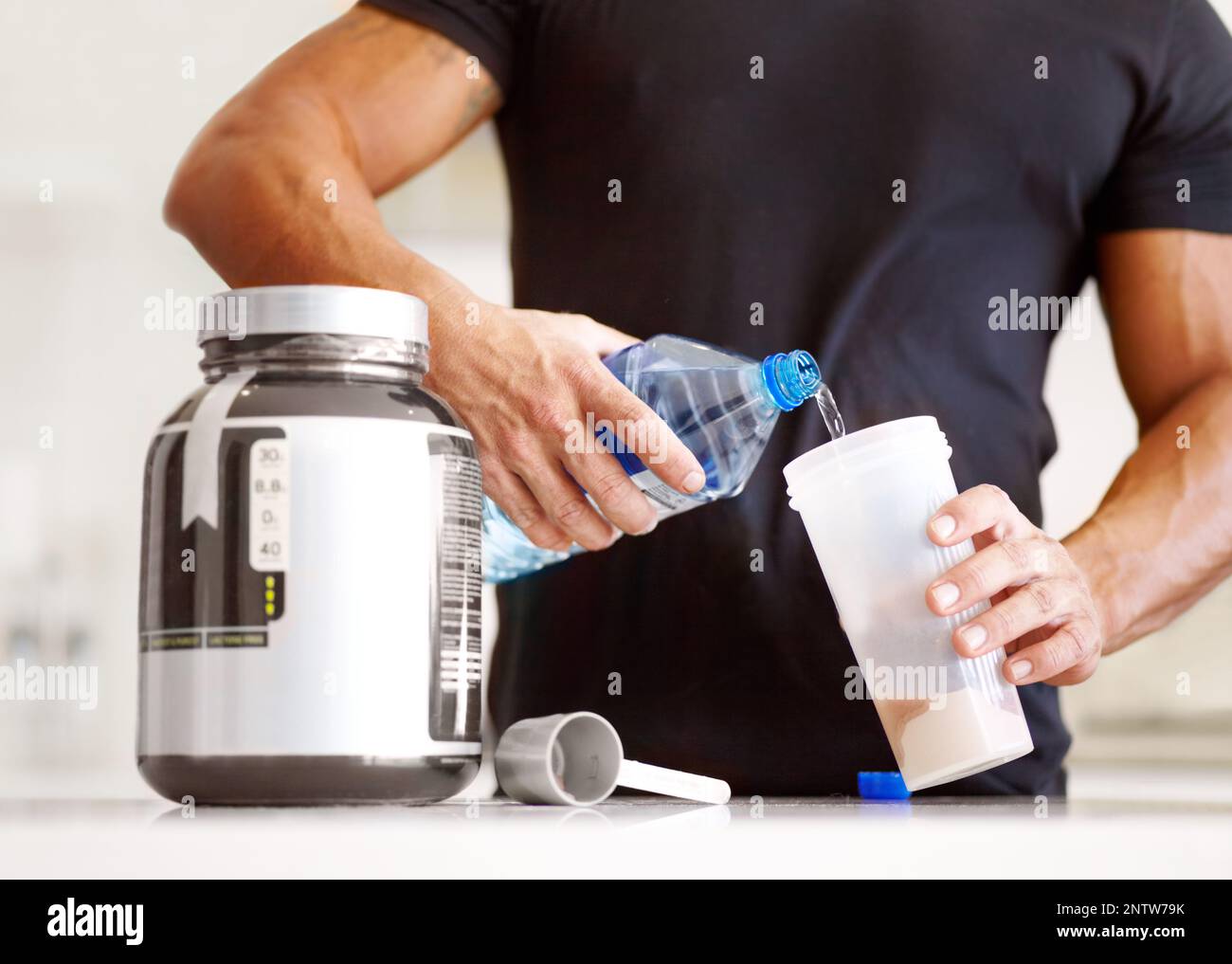 Getting enough protein in your diet. Cropped image of a bodybuilder