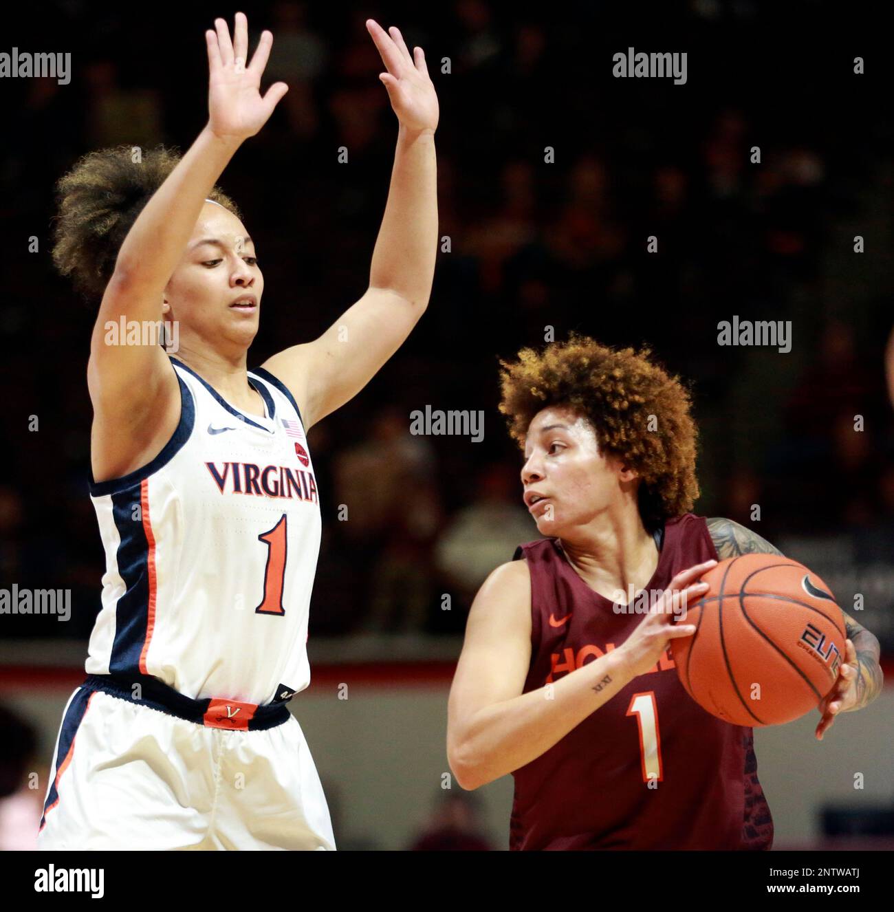 Virginia Techs Taylor Emery 1 Looks To Pass While Guarded By Virginias Brianna Tinsley 1 