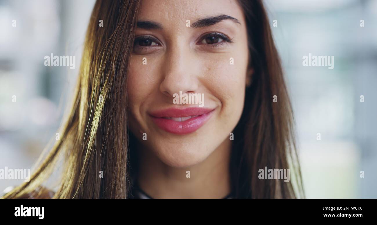 Beautiful, smiling and young female face feeling confident and charming