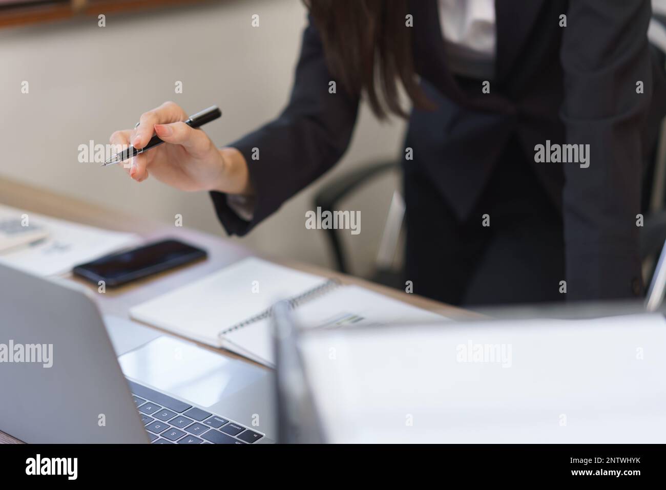 Secretary Reading Work of secretary concept, Female secretary reading data on laptop and ...