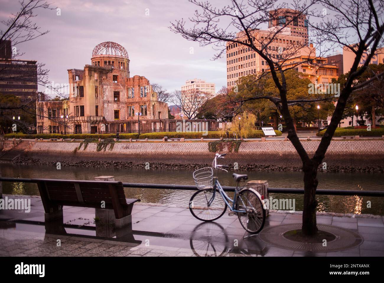 Atomic Bomb Dome (Gembaku) and Motoyasugawa river, Peace Park, Hiroshima, Japan Stock Photo