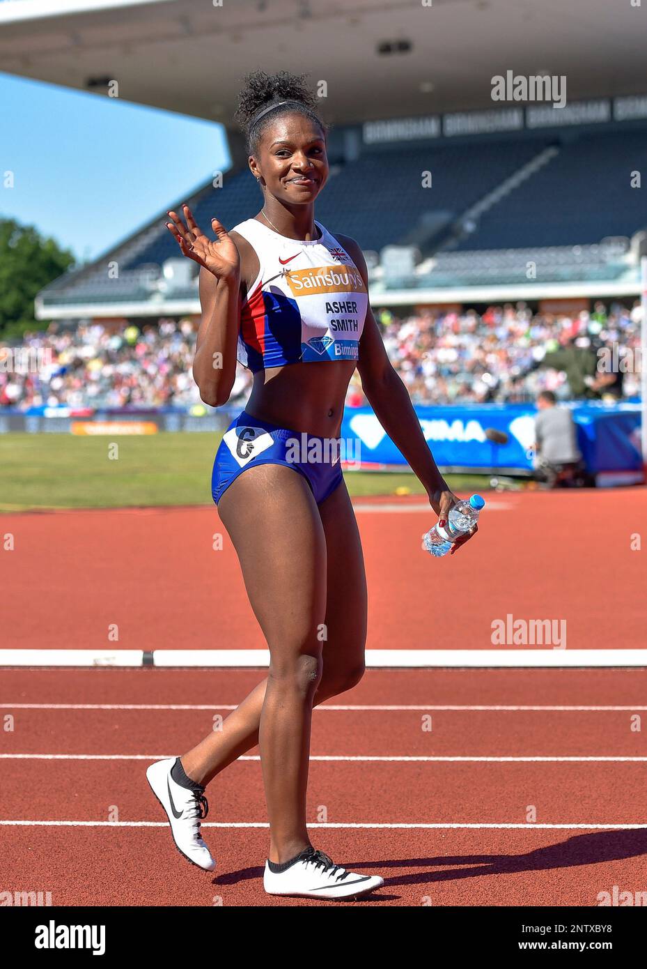 Dina Asher-Smith (GB) celebrates after running a Personal Best in