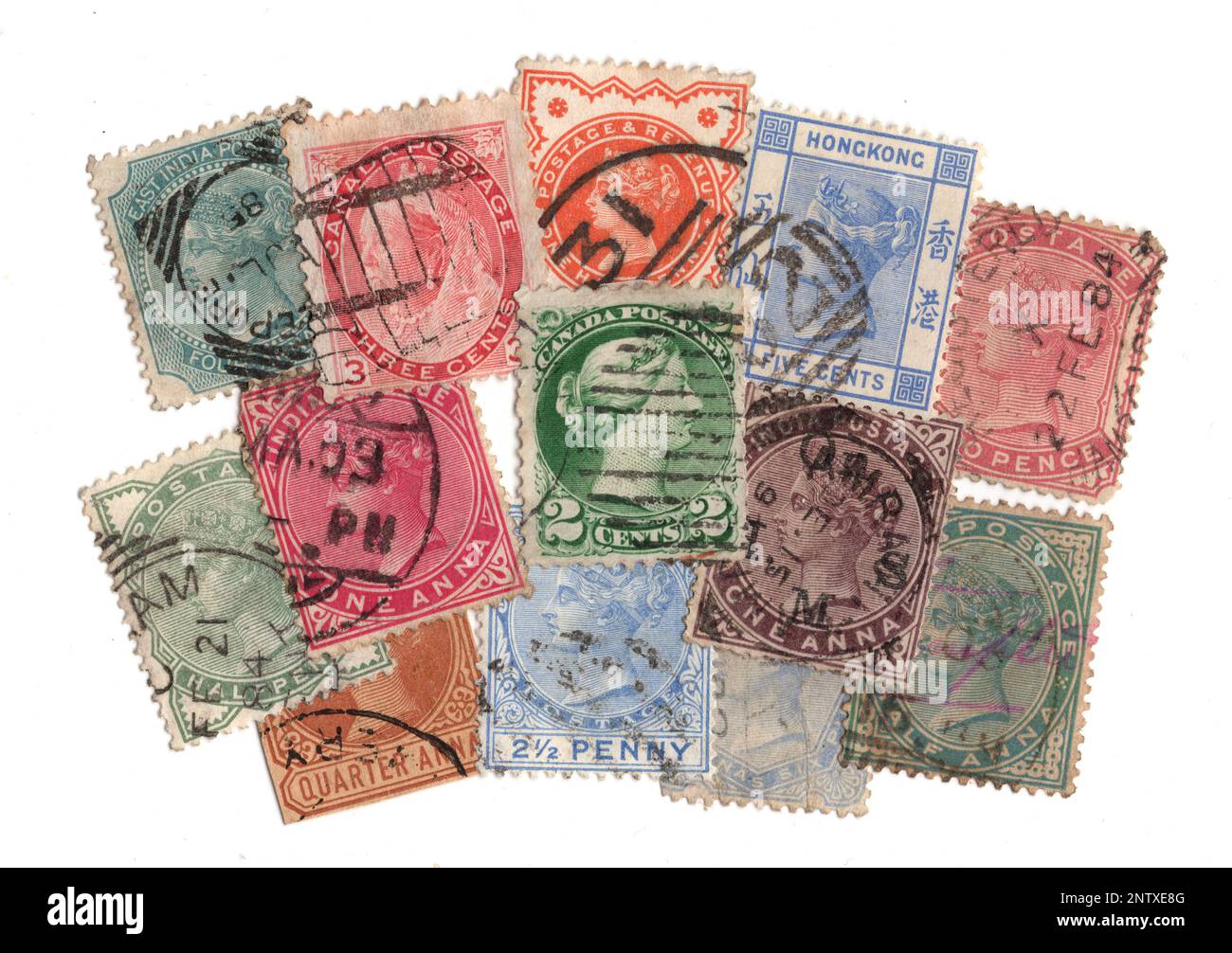 Vintage Queen Victoria postage stamps on a white background Stock Photo