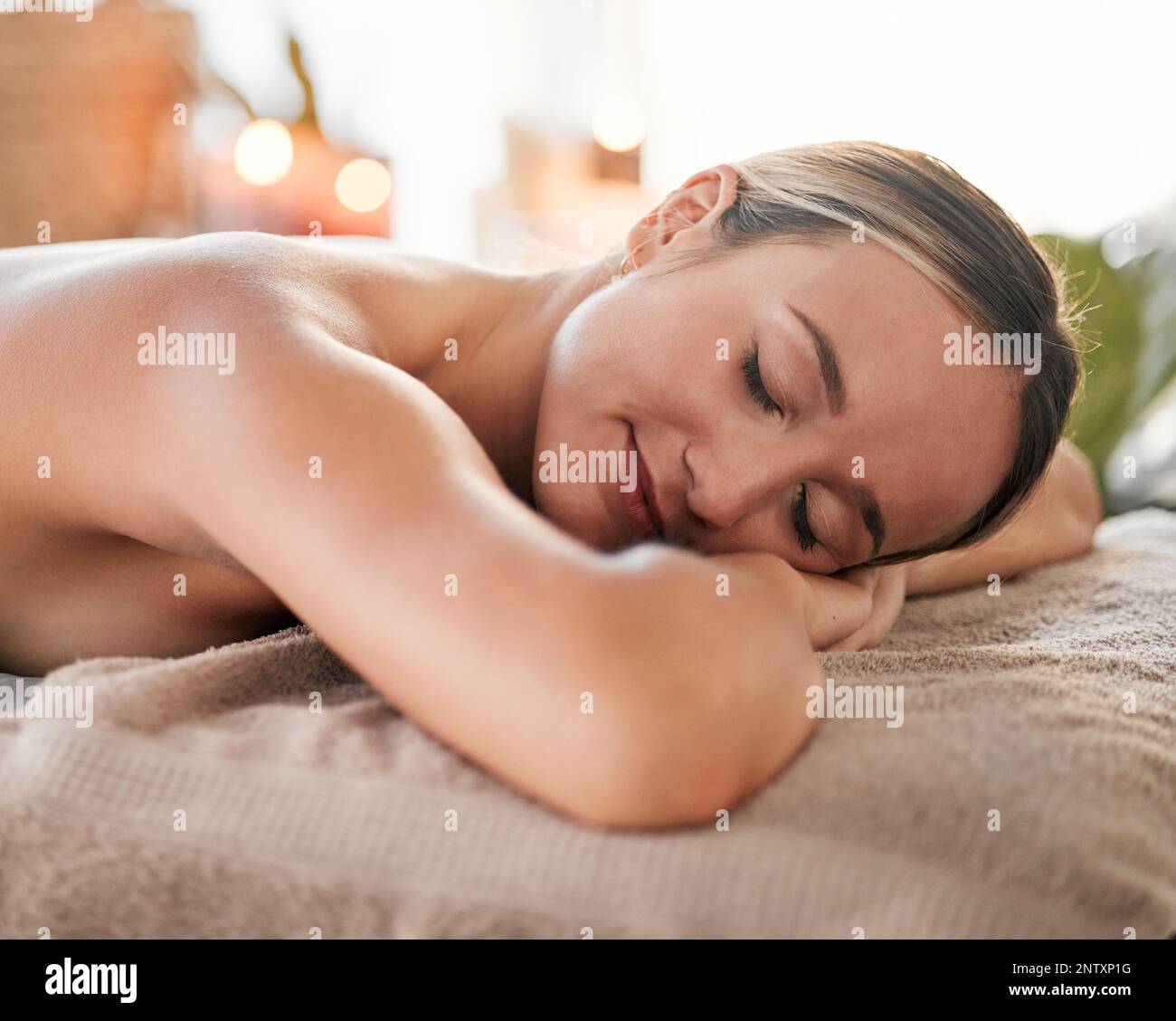 Relax, spa and sleeping woman in massage bed for wellness, peace and luxury pic