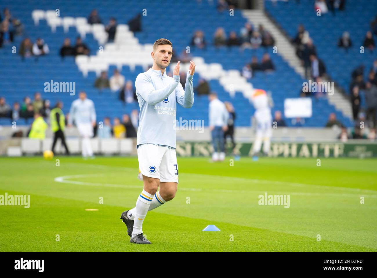 Joel Veltman of Brighton acknowledges the fans during the warm up before the Brighton and Hove Albion v Fulham Premier League match at the American Express Community Stadium, Brighton. Saturday 18th February 2023 Stock Photo