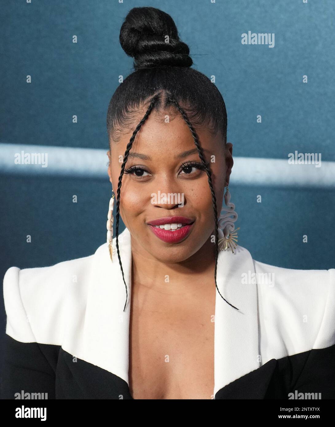 Dominique Fishback arrives at the CREED III Los Angeles Premiere held