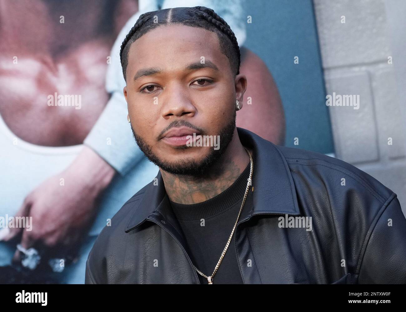 Cozz Rapper Cozz arrives at the CREED III Los Angeles Premiere held at the TCL ...
